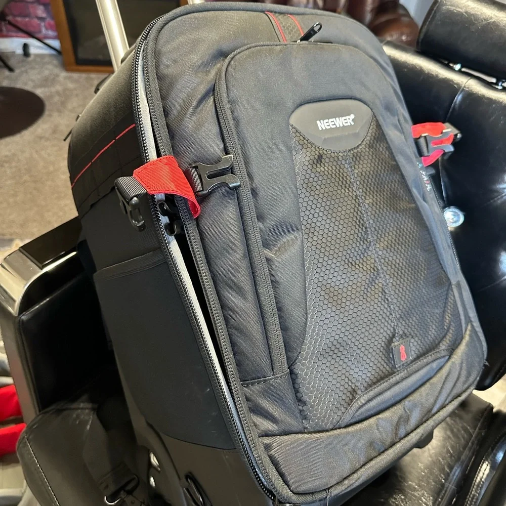 A backpack for a professional photographer. There's space for lenses